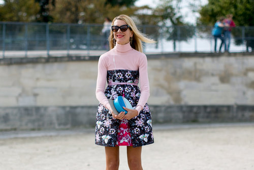 Natalie Joos perfects her sweet look with a bold pop of blue on her clutch.
Natalie Joos perfects her sweet look with a bold pop of blue on her clutch.