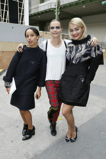 Cara Delevingne — posing here with pals Zoë Kravitz and Rita Ora — rocked Topshop's punky checkered pants with a white tee outside the shows at Paris Fashion Week.
Cara Delevingne — posing here with pals Zoë Kravitz and Rita Ora — rocked Topshop's punky checkered pants with a white tee outside the shows at Paris Fashion Week.