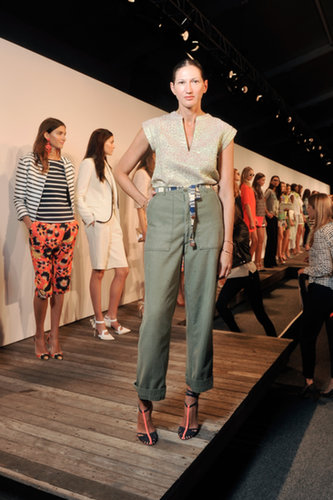 To show off J.Crew's Spring 2014 lineup, Lyons tucked a sparkly gold top into high-waisted pants and accessorized with t-strap heels and a casual belt.
To show off J.Crew's Spring 2014 lineup, Lyons tucked a sparkly gold top into high-waisted pants and accessorized with t-strap heels and a casual belt.