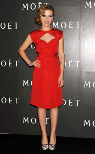 In vintage red Givenchy with a sweetheart cutout, Scarlett got our attention at Moet & Chandon's Tribute to Cinema in October 2009.
In vintage red Givenchy with a sweetheart cutout, Scarlett got our attention at Moet & Chandon's Tribute to Cinema in October 2009.