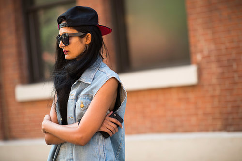 A backwards cap looks quite cool up against a grungy style.
A backwards cap looks quite cool up against a grungy style.