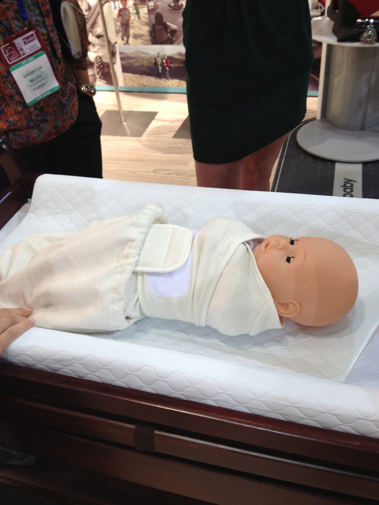 Ergo's Swaddler is specifically designed to keep hips loose — there's no wrapping around the hips, just a cover to keep tots warm. 
