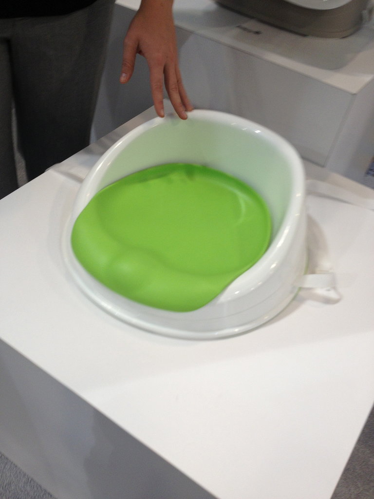 Safety First's new booster seat has a riser under it that lifts kids to two different heights — and it's really easy to clean!
