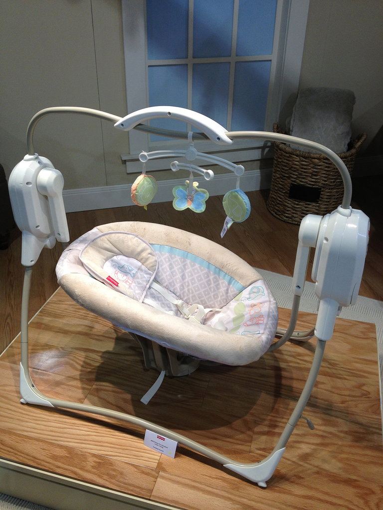 Fisher Price's Space-Saver Cradle and Swing has two different rocking motions and takes up less of a footprint than the papasan version.
