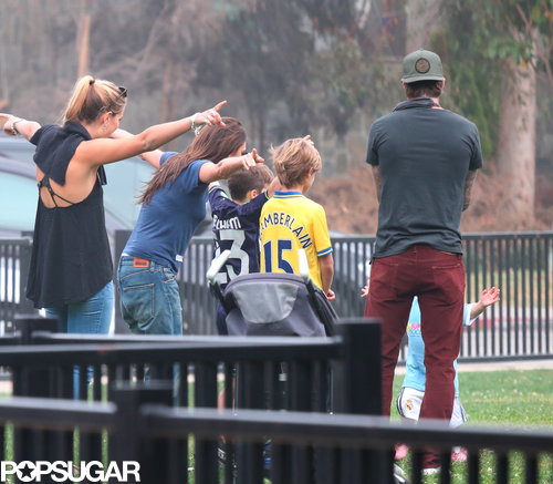 Victoria Beckham did soccer-mom duty while Harper played.
Victoria Beckham did soccer-mom duty while Harper played.