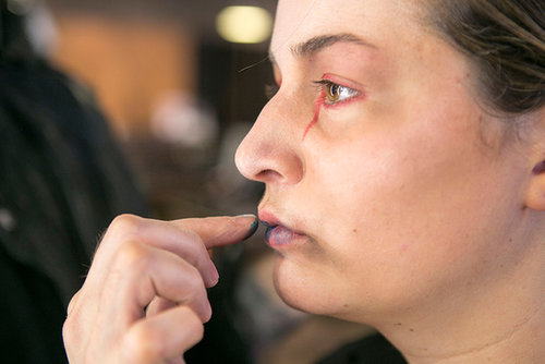 The key to a convincing zombie is just to keep layering colors and shades. So, Bouchard went back and added more shadows to the skin with various shades of brown.
Then, he added a touch of Lipmix in Blue ($15) on the lips and on face to create bruises.
The key to a convincing zombie is just to keep layering colors and shades. So, Bouchard went back and added more shadows to the skin with various shades of brown.
Then, he added a touch of Lipmix in Blue ($15) on the lips and on face to create bruises.