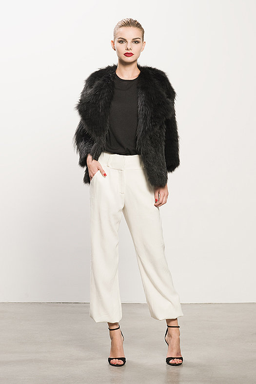 Coyote Black Fur Coat ($2,295) Cashmere Black Tee ($295), Crepe Cream Elastic Botton Pant ($595), Whisper Black Suede Sandal ($595)
Photo courtesy of Tamara Mellon
Coyote Black Fur Coat ($2,295) Cashmere Black Tee ($295), Crepe Cream Elastic Botton Pant ($595), Whisper Black Suede Sandal ($595)
Photo courtesy of Tamara Mellon