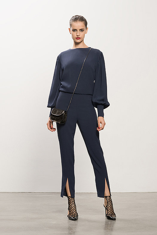 Crepe Navy Jumpsuit ($995), Secret Place Black Open Back Bootie ($895), Treasure Black Suede Cross Body Bag ($650)
Photo courtesy of Tamara Mellon
Crepe Navy Jumpsuit ($995), Secret Place Black Open Back Bootie ($895), Treasure Black Suede Cross Body Bag ($650)
Photo courtesy of Tamara Mellon