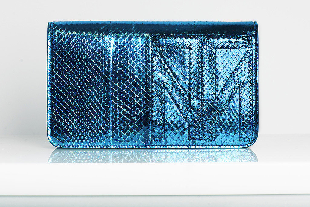 TM Enjoy Watersnake Clutch in Turquoise ($695)
Photo courtesy of Tamara Mellon
TM Enjoy Watersnake Clutch in Turquoise ($695)
Photo courtesy of Tamara Mellon