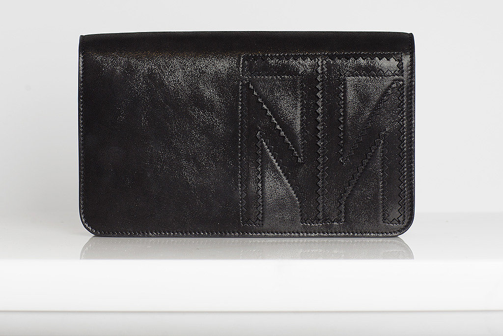 TM Enjoy Calf Clutch in Black ($595)
Photo courtesy of Tamara Mellon
TM Enjoy Calf Clutch in Black ($595)
Photo courtesy of Tamara Mellon