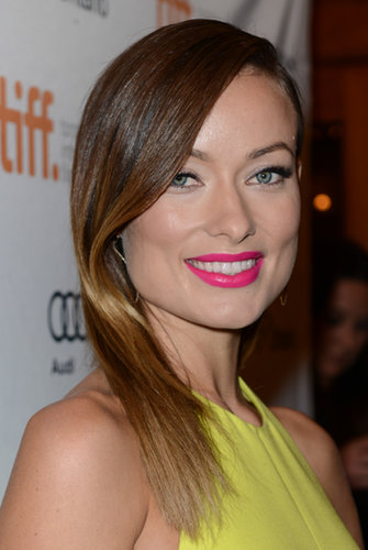 At the Third Person premiere in Toronto in September, Olivia showed off another version of ombré and topped her bold ensemble off with a neon pink lipstick.
At the Third Person premiere in Toronto in September, Olivia showed off another version of ombré and topped her bold ensemble off with a neon pink lipstick.