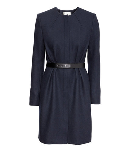 The cinched waist and rounded shoulders give this The cinched waist and rounded shoulders give this