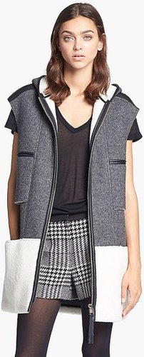 When Fall hits, I'm all about layering — playing with silhouettes, prints, and textures is my M.O. — and this colorblock Mcginn vest ($325) is the ideal transitional topper. I'll stay toasty in the cashmere and shearling fibers without the worry of hiding my entire ensemble. Bonus: it has a hood to battle the weather or bad hair days.
— Mandi Villa, contributing editor
When Fall hits, I'm all about layering — playing with silhouettes, prints, and textures is my M.O. — and this colorblock Mcginn vest ($325) is the ideal transitional topper. I'll stay toasty in the cashmere and shearling fibers without the worry of hiding my entire ensemble. Bonus: it has a hood to battle the weather or bad hair days.
— Mandi Villa, contributing editor