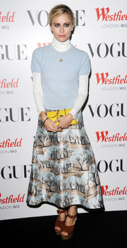 Laura Bailey layered preppy separates and added a bold yellow clutch at Westfield's London bash.
Laura Bailey layered preppy separates and added a bold yellow clutch at Westfield's London bash.