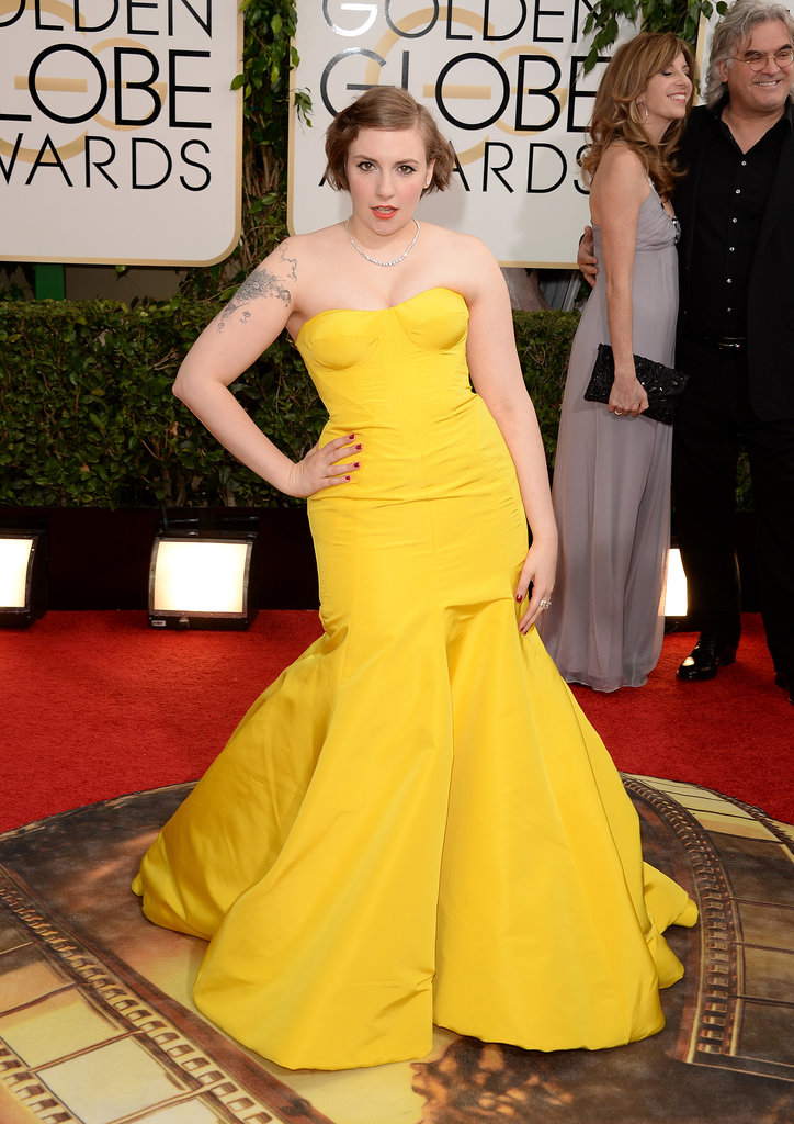 Lena Dunham looked stunning in a bright yellow Zac Posen dress at the Golden Globe Awards.
Lena Dunham looked stunning in a bright yellow Zac Posen dress at the Golden Globe Awards.