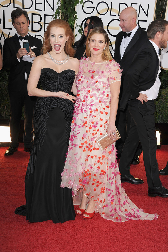Jessica Chastain showed off Drew Barrymore's baby bump on the Golden Globes red carpet. 