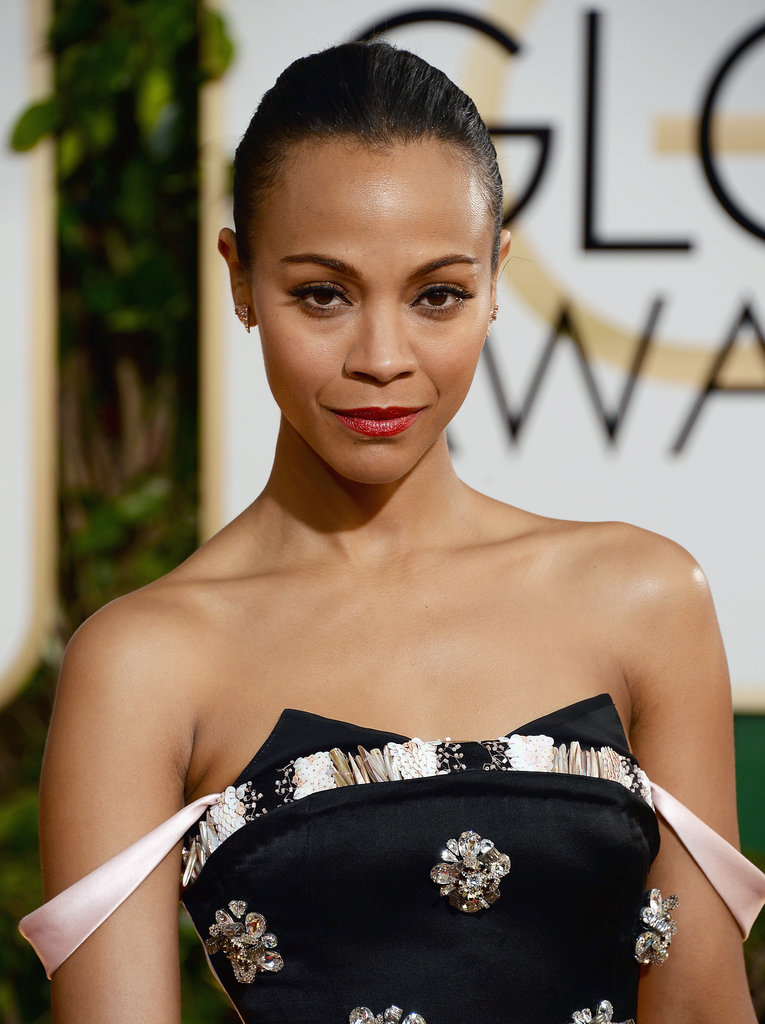Zoe Saldana's slicked-back strands and inky eyeliner oozed high fashion.
Zoe Saldana's slicked-back strands and inky eyeliner oozed high fashion.