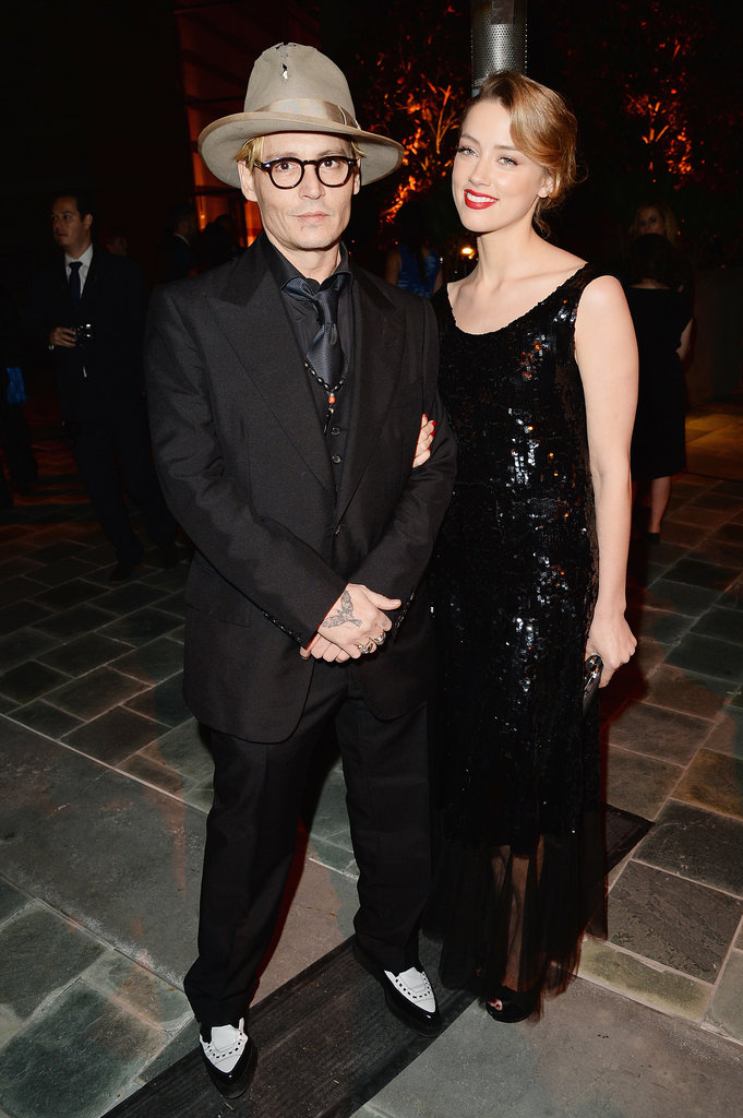 Johnny Depp and Amber Heard kept close to one another during the dinner. Johnny's presence even flustered Linda Perry, who admitted she lost her train of thought during her opening speech after spotting him in the audience! Johnny Depp and Amber Heard kept close to one another during the dinner. Johnny's presence even flustered Linda Perry, who admitted she lost her train of thought during her opening speech after spotting him in the audience!