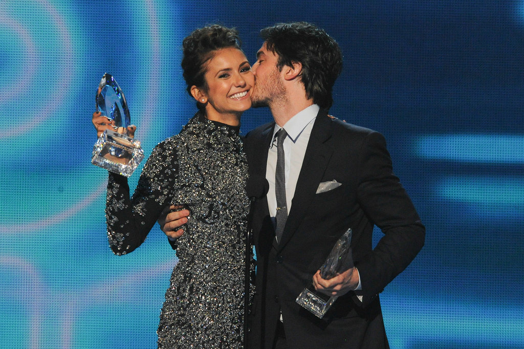 To the delight of Vampire Diaries fans everywhere, Ian Somerhalder gave Nina Dobrev a kiss on stage at the People's Choice Awards.
To the delight of Vampire Diaries fans everywhere, Ian Somerhalder gave Nina Dobrev a kiss on stage at the People's Choice Awards.