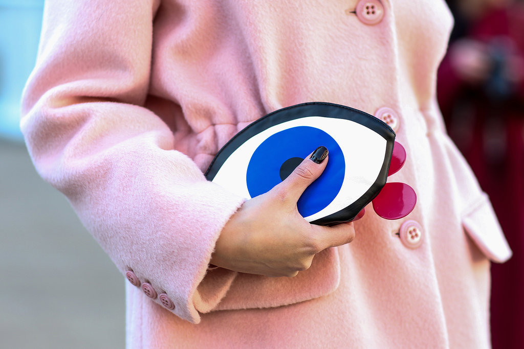 We spy a quirky bit of arm candy.
We spy a quirky bit of arm candy.