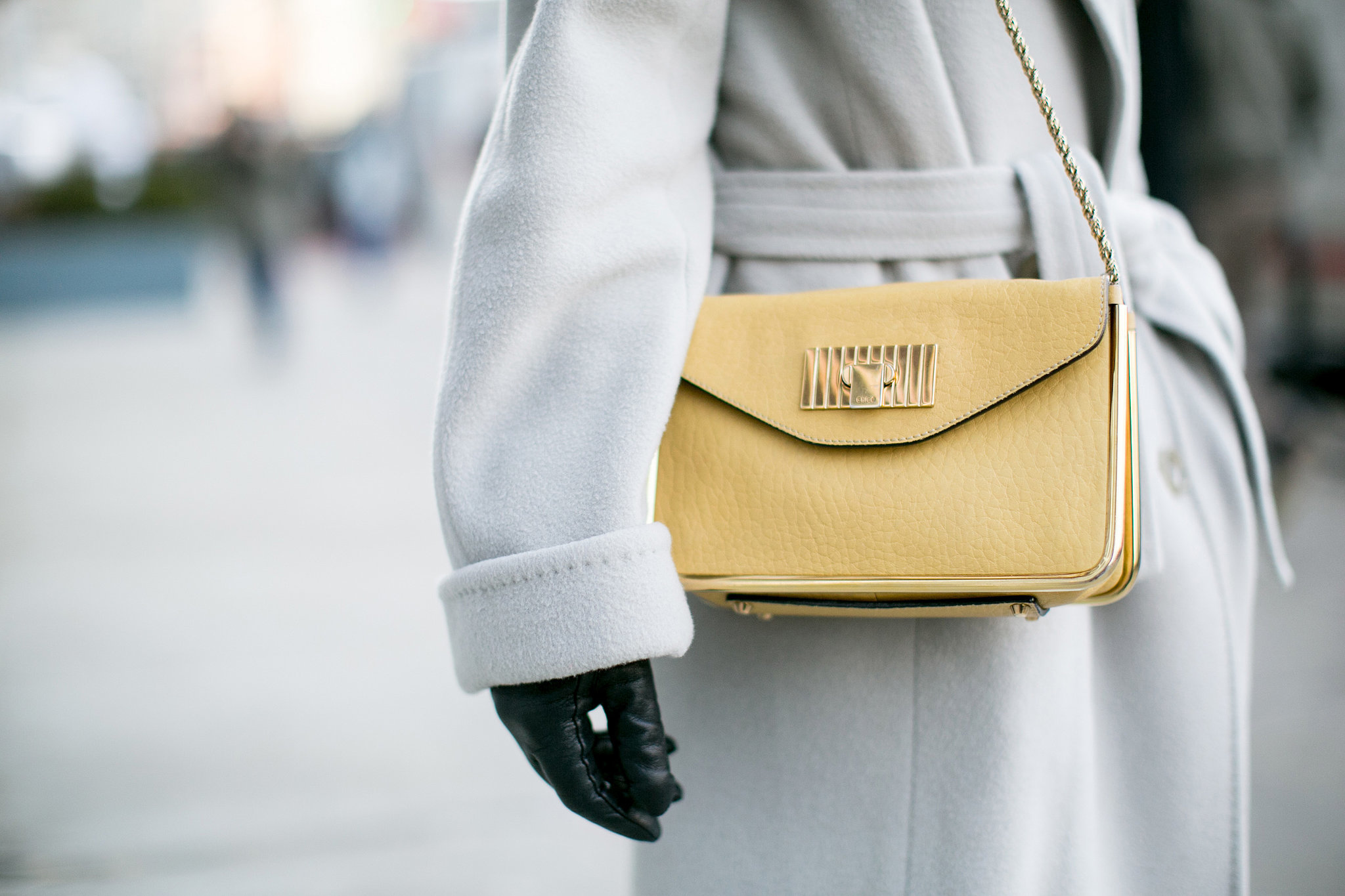 This pale yellow bag plays right into her pale color story. 
