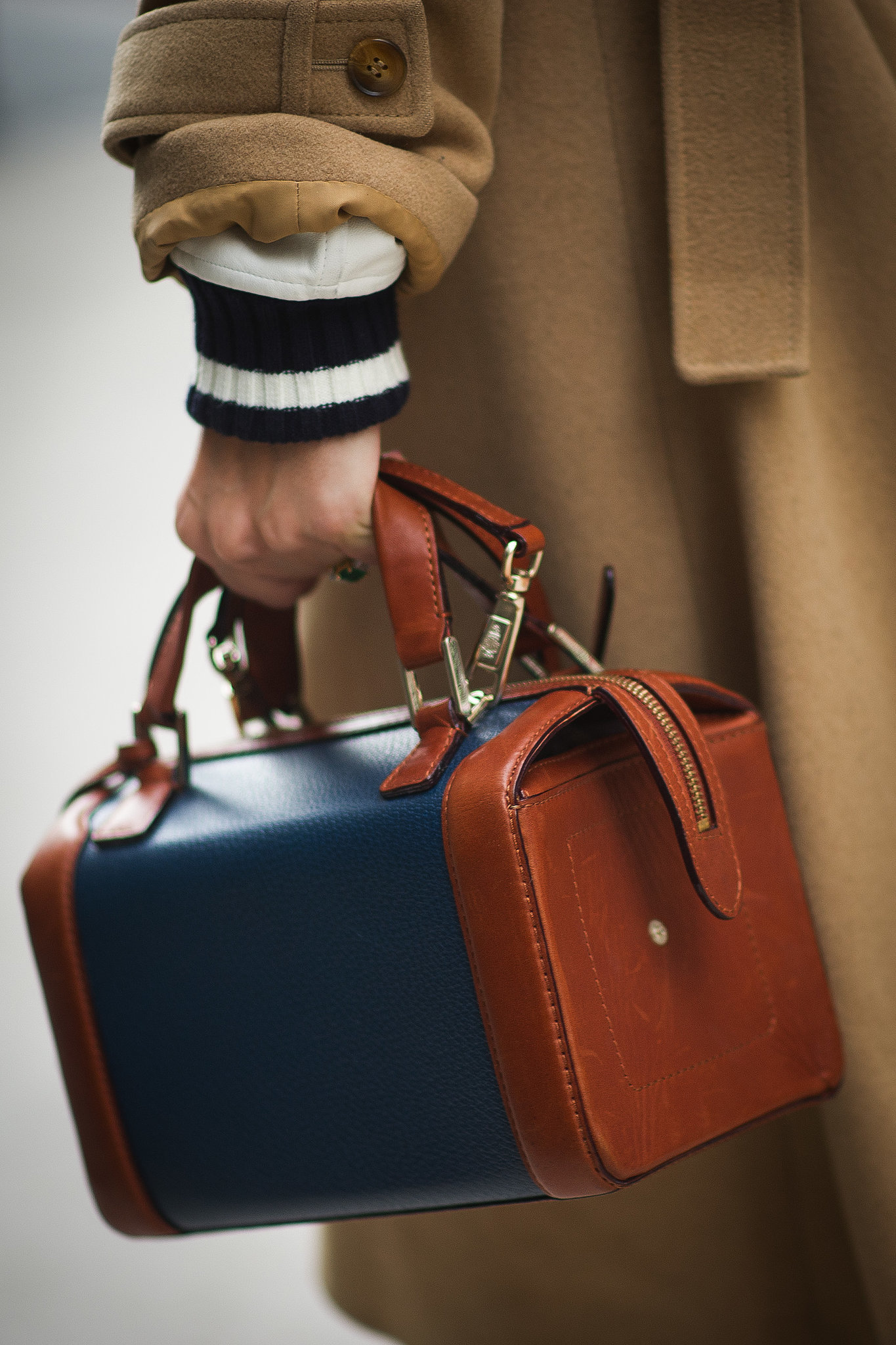 We're smitten with her classic carry-all. 
