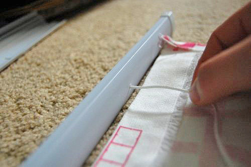 Pop the button on the bottom that holds the thick cord that runs through the blinds, and pull that cord out.
Source: Made2Style
Pop the button on the bottom that holds the thick cord that runs through the blinds, and pull that cord out.
Source: Made2Style
