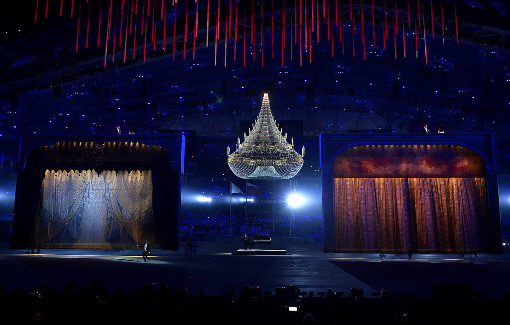 Two giant stages popped up in the middle of the arena, a chandelier hanging between them.
