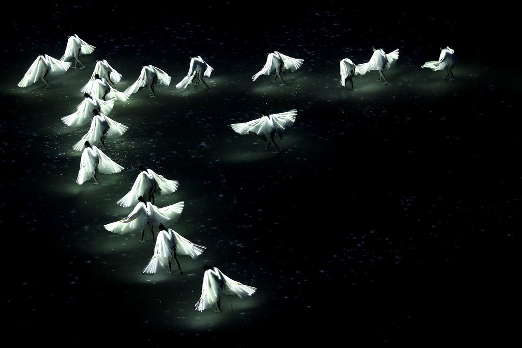 During the Pyeongchang portion, dancers wore lit-up wings.
