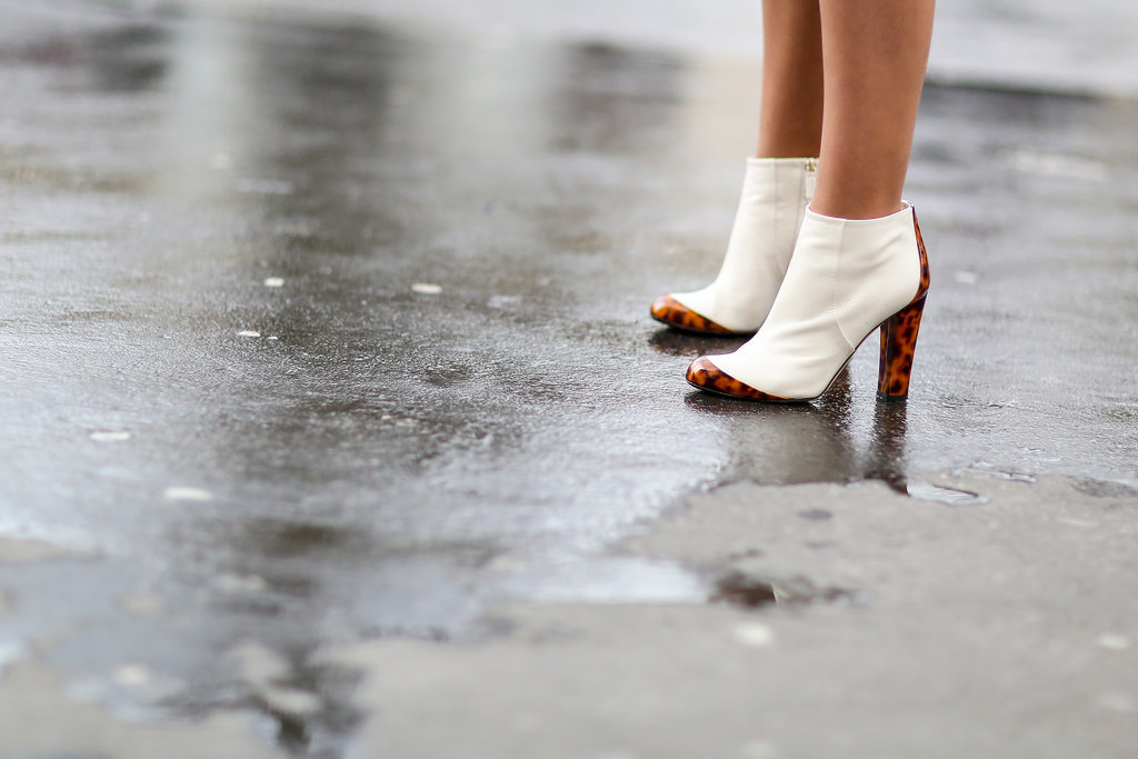 These white booties pack even more of a punch, thanks to tortoiseshell detailing.
These white booties pack even more of a punch, thanks to tortoiseshell detailing.