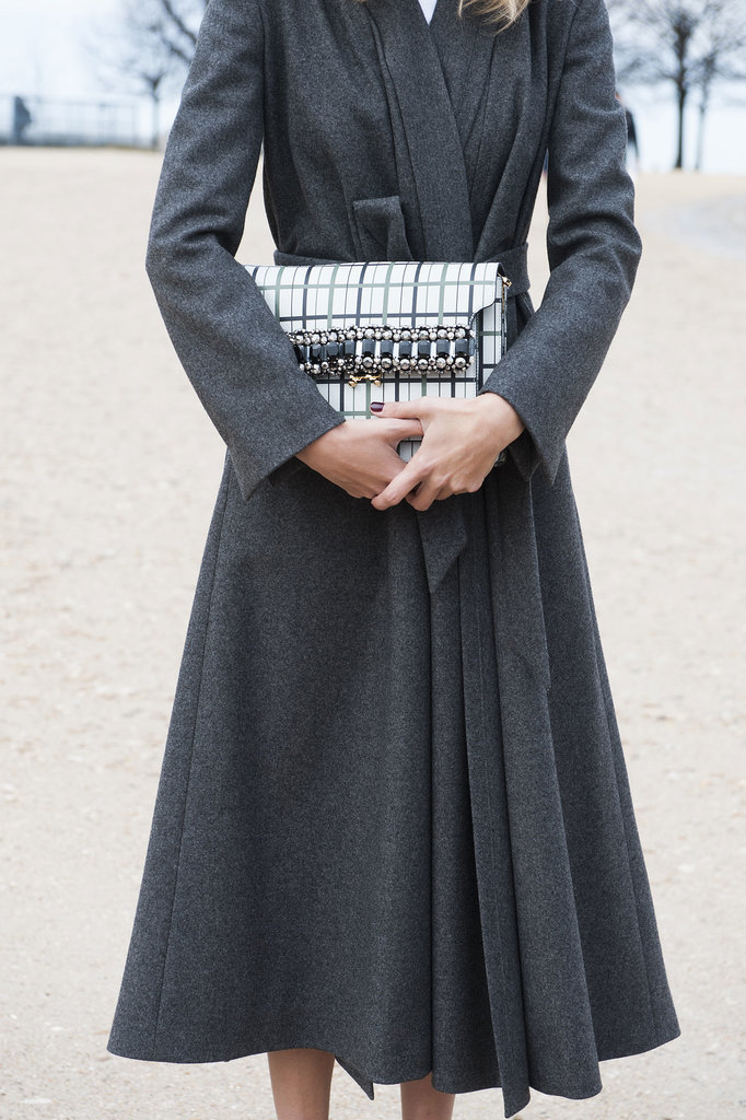 We don't blame her for holding that pretty purse so tight.
We don't blame her for holding that pretty purse so tight.