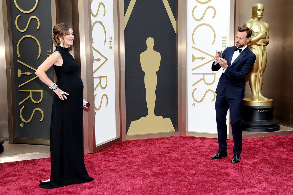 Jason Sudeikis stepped back to take a snap of his pregnant fiancée, Olivia Wilde, on the red carpet — and she wasn't the only mom-to-be at the Oscars.
Jason Sudeikis stepped back to take a snap of his pregnant fiancée, Olivia Wilde, on the red carpet — and she wasn't the only mom-to-be at the Oscars.