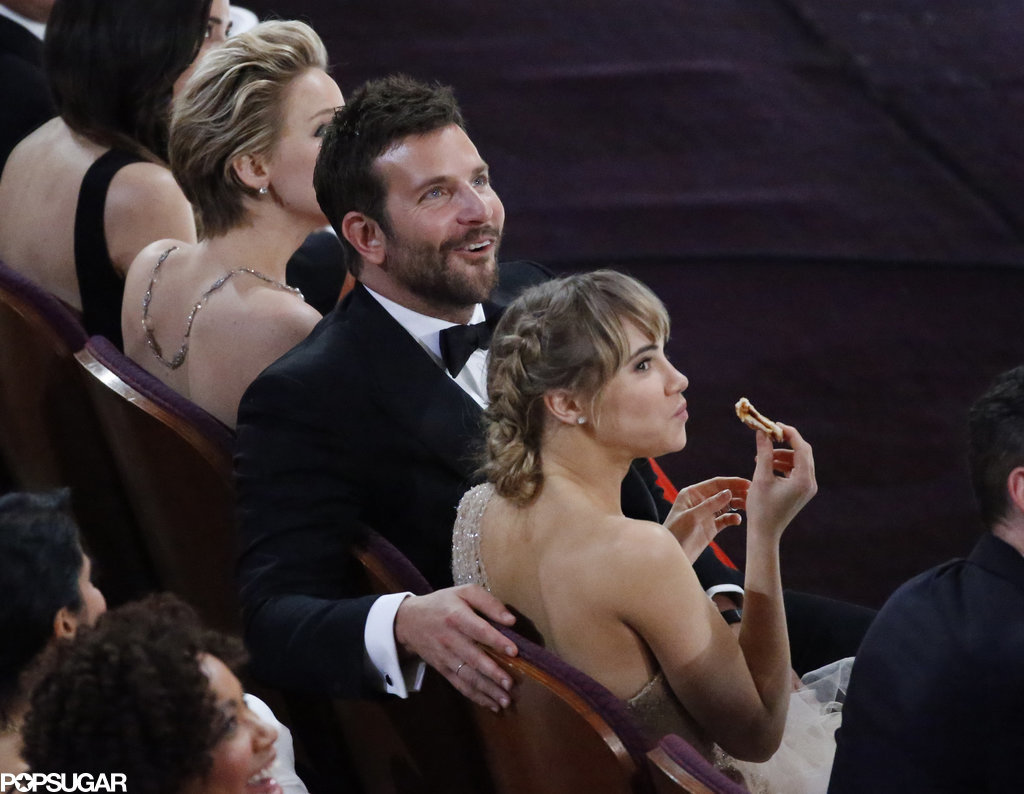 Bradley Cooper's girlfriend, Suki Waterhouse, snacked on pizza in the front row after Ellen passed around a few pies in the audience.
Bradley Cooper's girlfriend, Suki Waterhouse, snacked on pizza in the front row after Ellen passed around a few pies in the audience.