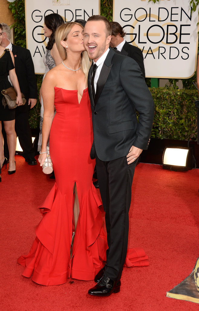 Aaron Paul got a sweet kiss on the cheek from his new wife, Lauren Parsekian, at the Golden Globes.
Aaron Paul got a sweet kiss on the cheek from his new wife, Lauren Parsekian, at the Golden Globes.