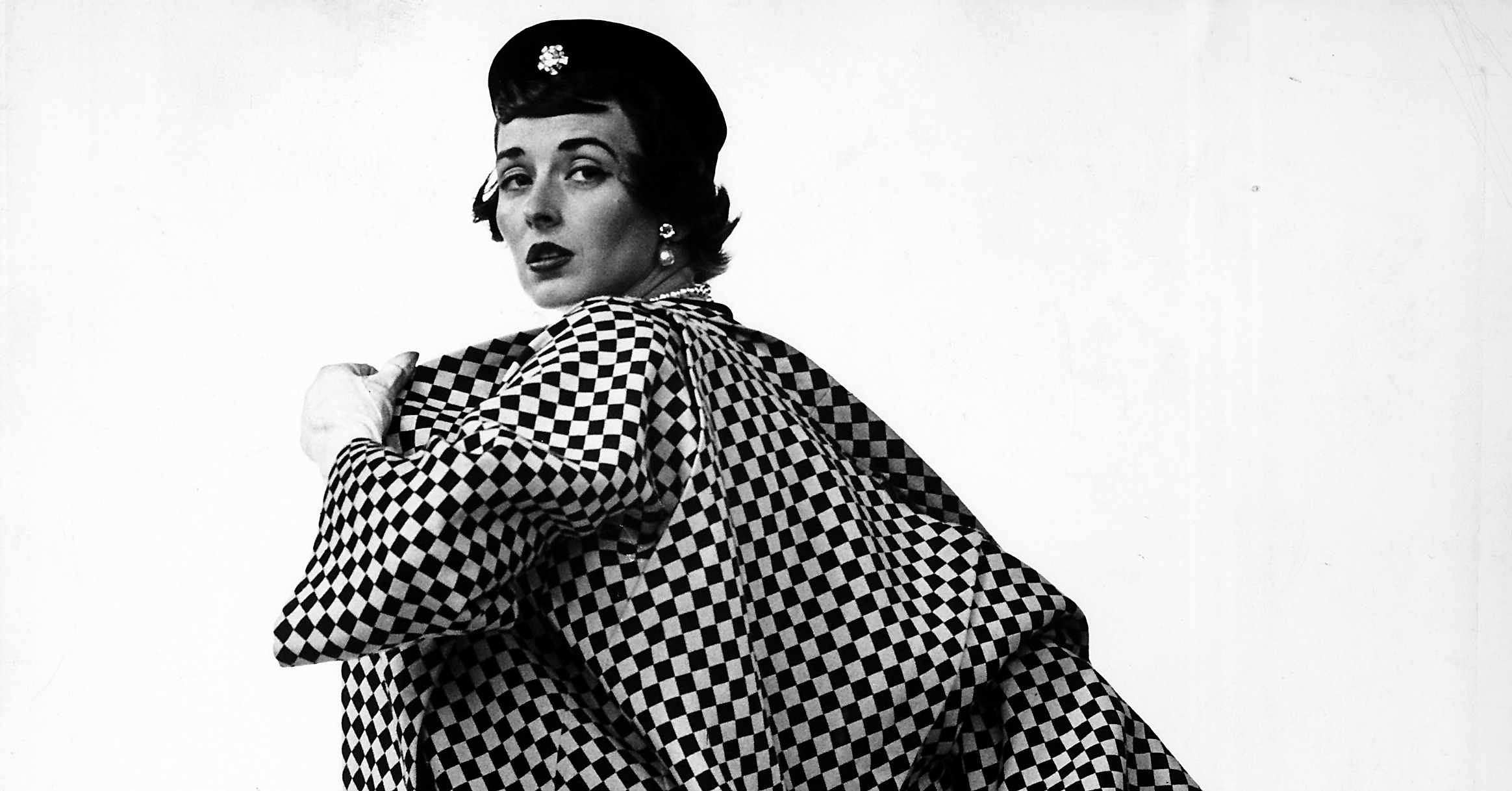 Dorian Leigh, Trigere coat, 1950. Dorian Leigh, Trigere coat, 1950.