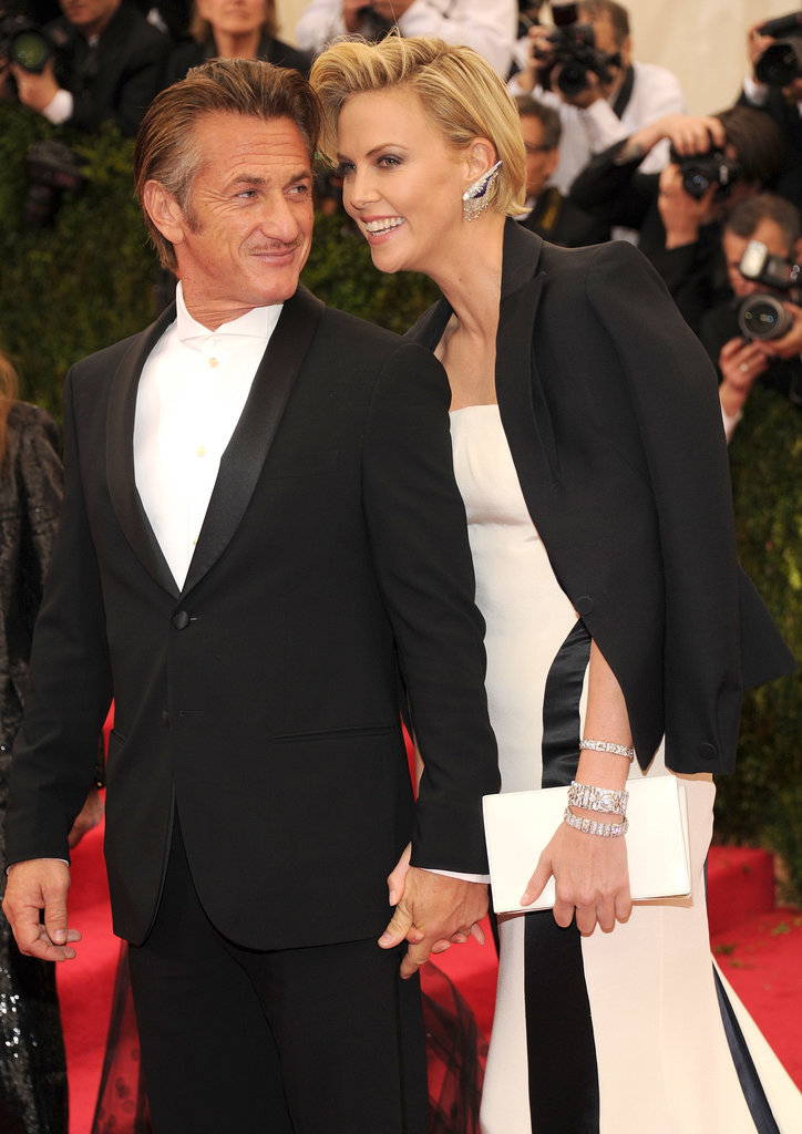 Charlize Theron stuck close to boyfriend Sean Penn on her way into the bash.
Charlize Theron stuck close to boyfriend Sean Penn on her way into the bash.
