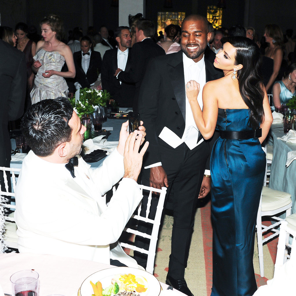 Kim Kardashian struck a pose with Kanye West during dinner.
Kim Kardashian struck a pose with Kanye West during dinner.