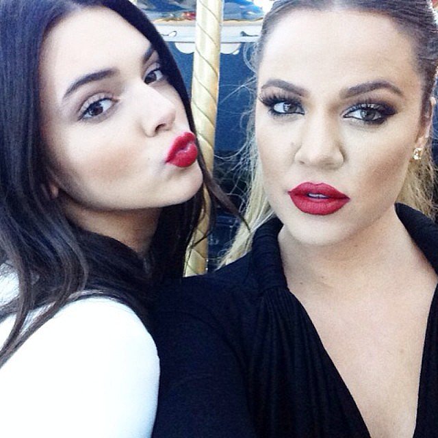 Kendall and Khloé were matching with their bright lips.
Source: Instagram user khloekardashian
