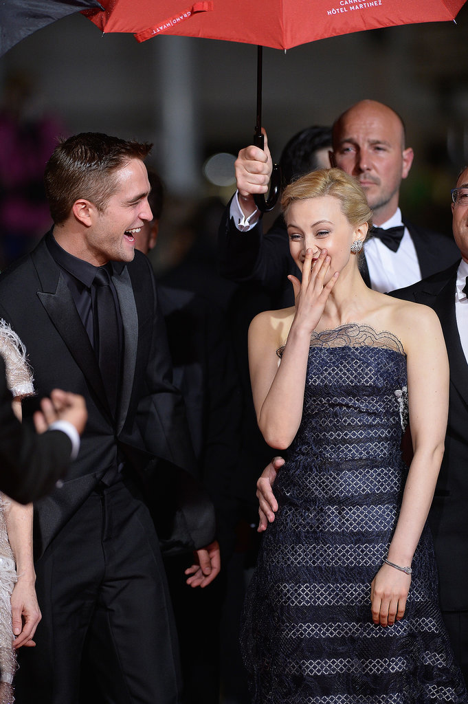 Sarah Gadon made Robert Pattinson laugh at the premiere of Map to the Stars at Cannes Film Festival on Monday.
