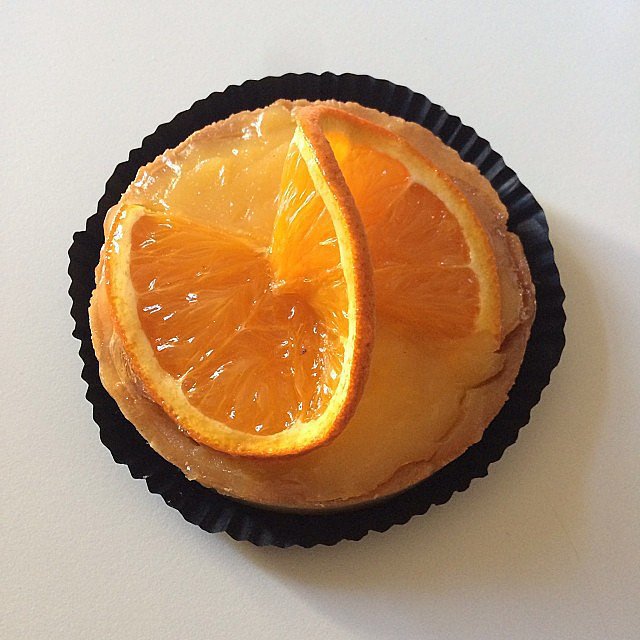 This orange tart from a boulangerie down the street from our apartment was almost too pretty to eat. That didn't stop us, however.
This orange tart from a boulangerie down the street from our apartment was almost too pretty to eat. That didn't stop us, however.