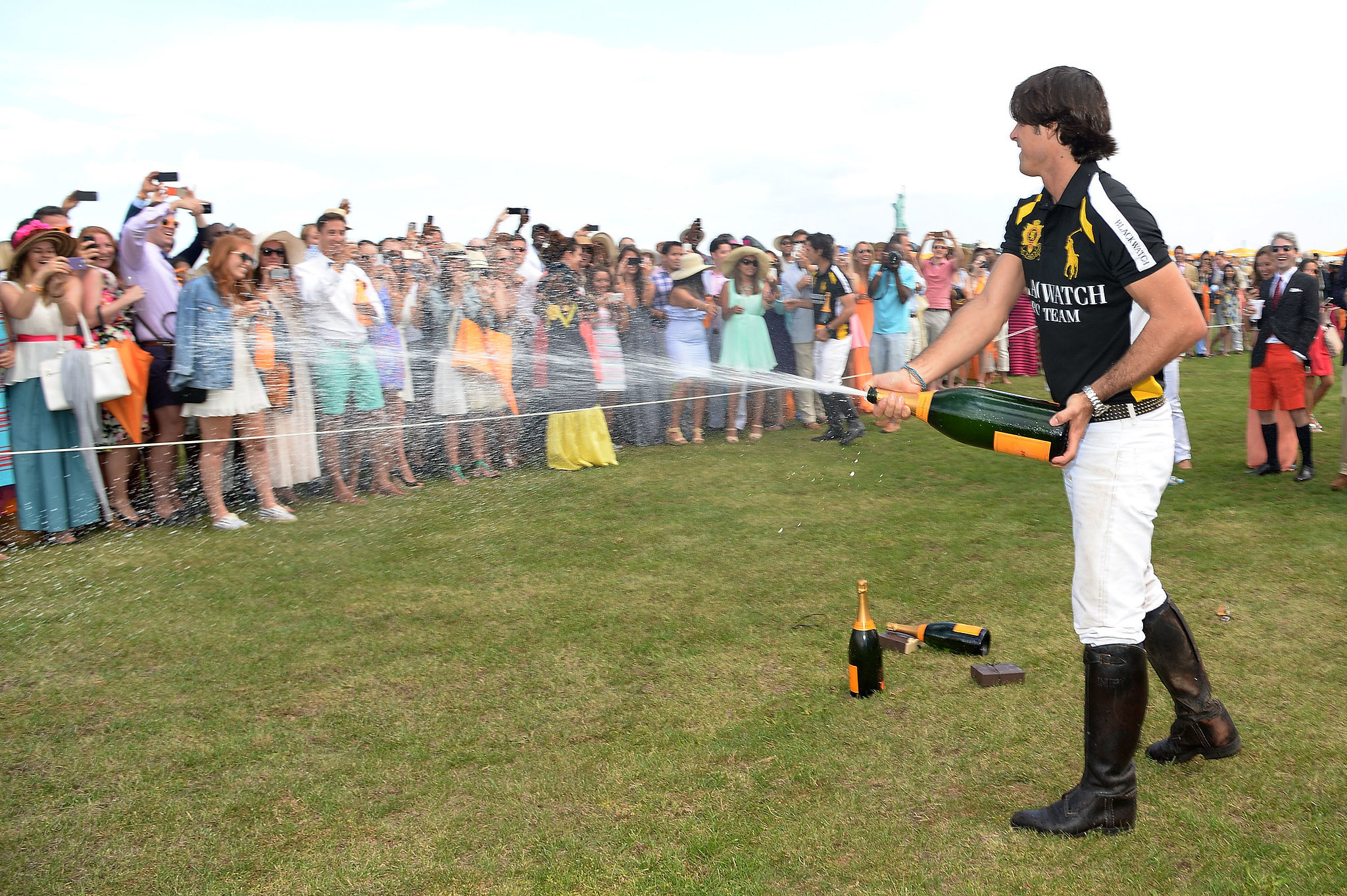 Nacho-had-fun-big-bottle-champagne.jpg