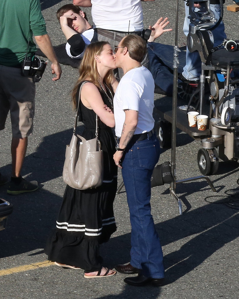 Amber Heard Doesn't Seem to Mind Johnny Depp's New Look Amber Heard Doesn't Seem to Mind Johnny Depp's New Look
