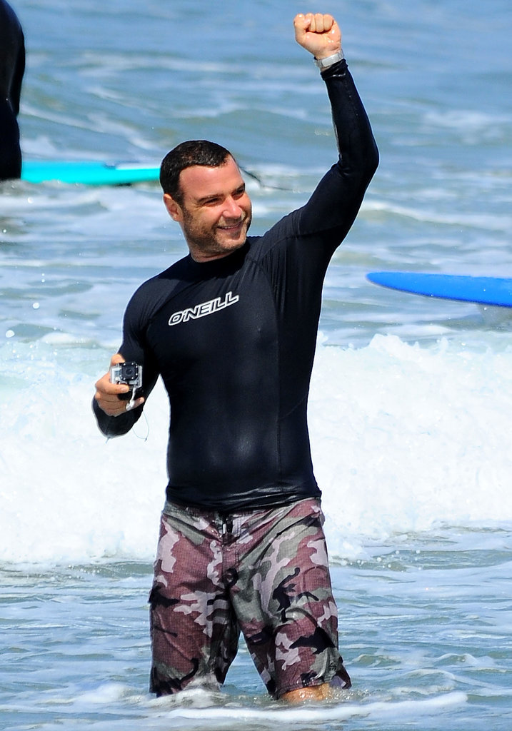 Liev Schreiber got excited while surfing with his family in LA on Sunday.
Liev Schreiber got excited while surfing with his family in LA on Sunday.