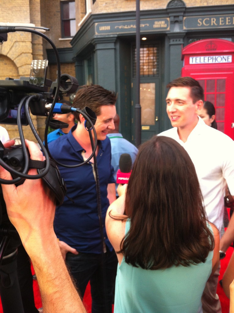 I spoke with James (left) and Oliver Phelps on the red carpet. The twins play the Weasley twins, Fred and George, although only one survives the series (as James reminded me).
I spoke with James (left) and Oliver Phelps on the red carpet. The twins play the Weasley twins, Fred and George, although only one survives the series (as James reminded me).