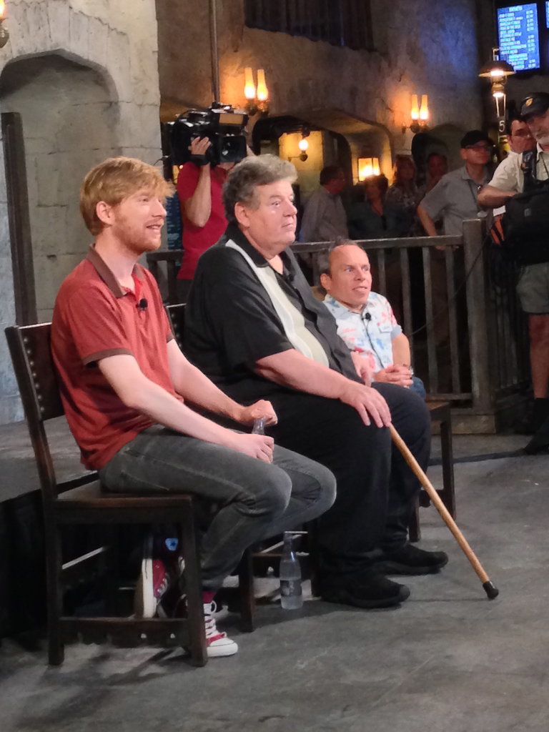 Domhnall Gleeson, Robbie Coltrane, and Warwick Davis listened to a question during their panel.
Domhnall Gleeson, Robbie Coltrane, and Warwick Davis listened to a question during their panel.