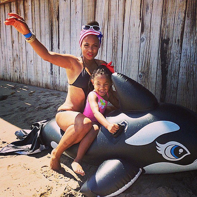Christina Milian and her daughter, Violet, played around on the beach together at Paris Hilton's annual party in Malibu, CA. Source: Instagram user christinamilian 