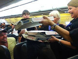 The Greatest Airline Pilot Ever Orders Pizza for Stranded Passengers The Greatest Airline Pilot Ever Orders Pizza for Stranded Passengers