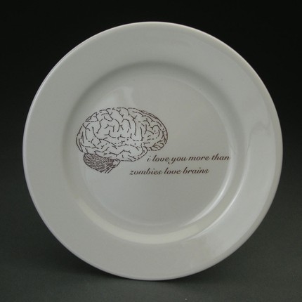 Remind your guests of zombies' favorite meal when you serve them on these Zombies Love Brains Plates ($60 for a set of 4). Remind your guests of zombies' favorite meal when you serve them on these Zombies Love Brains Plates ($60 for a set of 4).