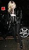 Photo of Kate Moss Wearing Black Lace-Up Jeans in London 2009-11-16 04:50:22