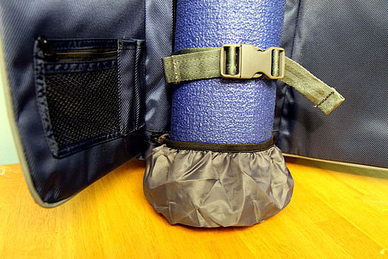 Inside of backpack, showing elastic mat protector
